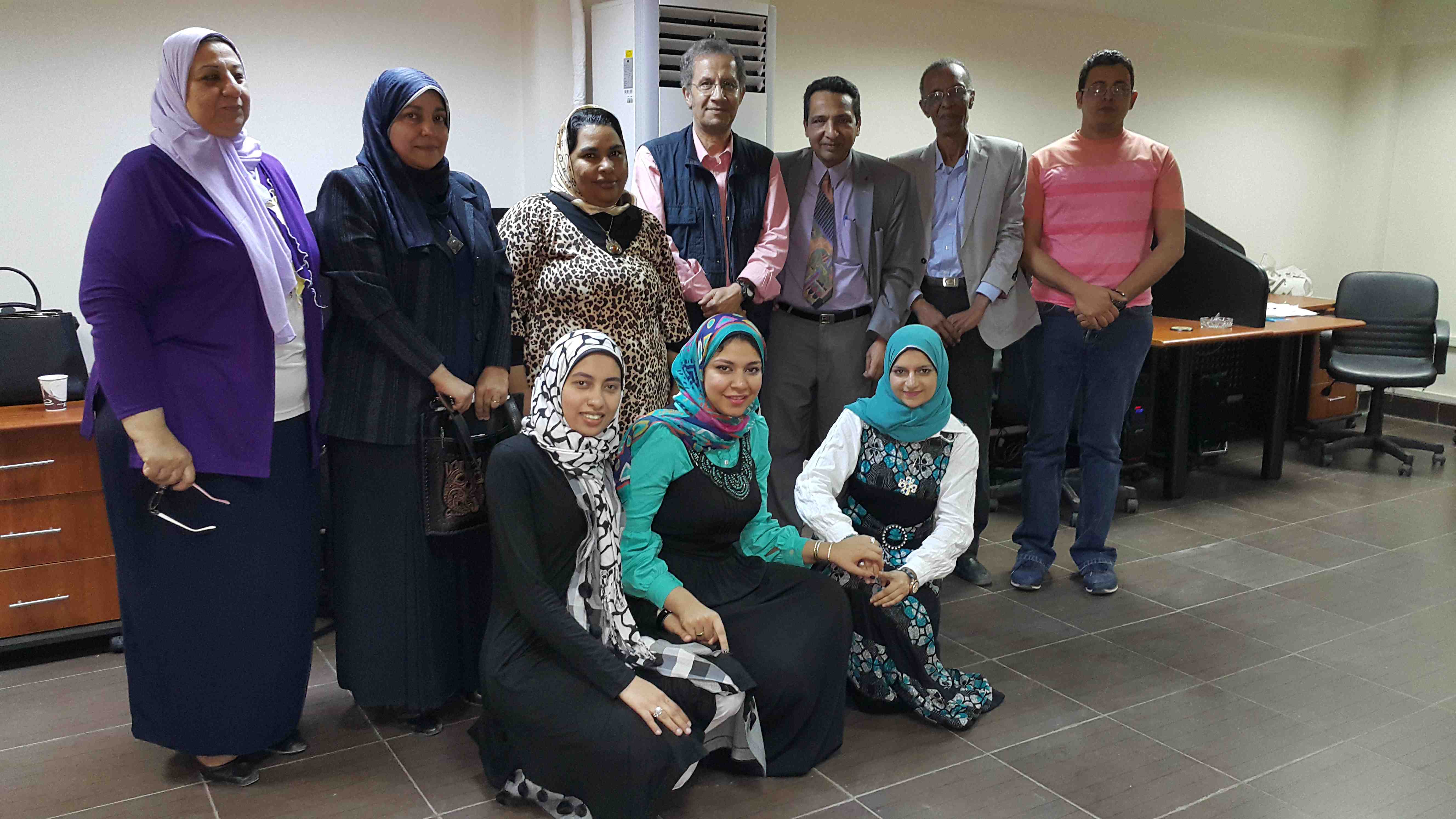 Prof. Mona Bakr with distinguished professors at Minia University